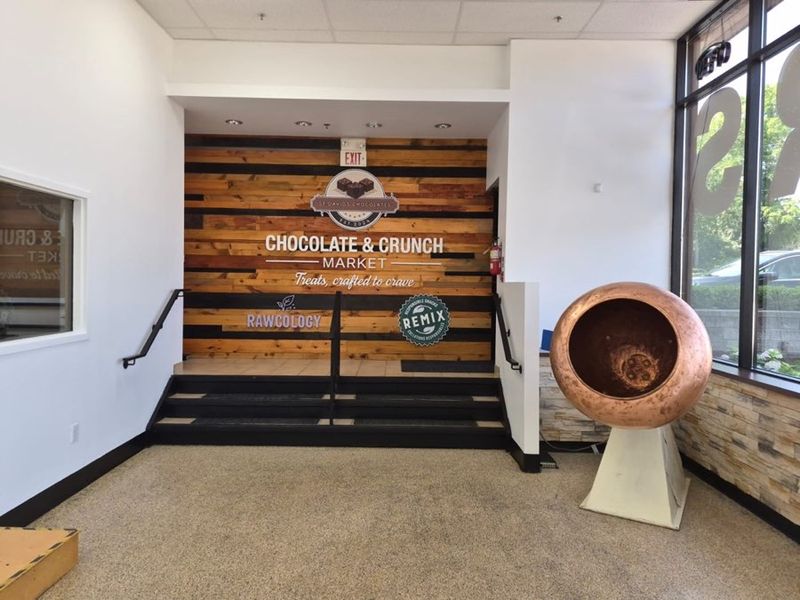 St. Davids shop entrance with a copper confectionery pan on display